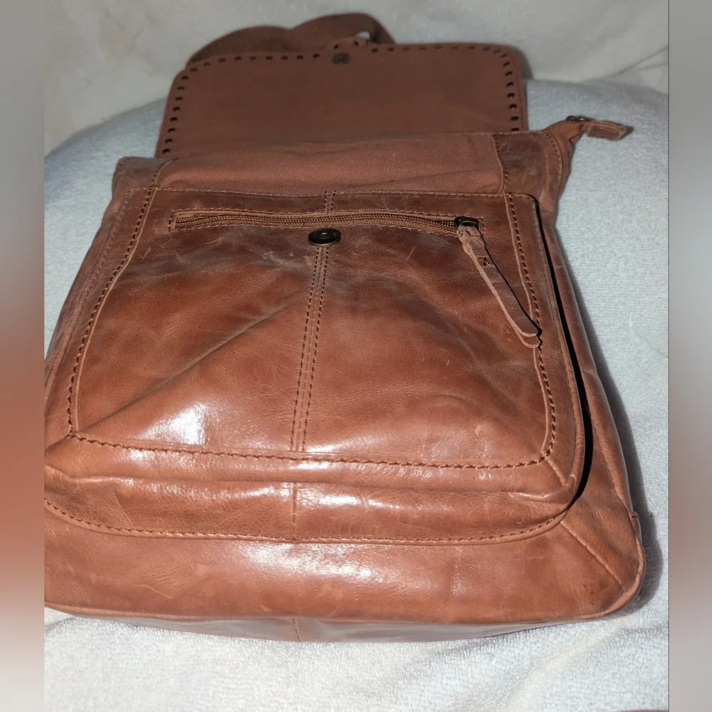 The Sak Ventura Convertible Tan Embossed Leather Backpack